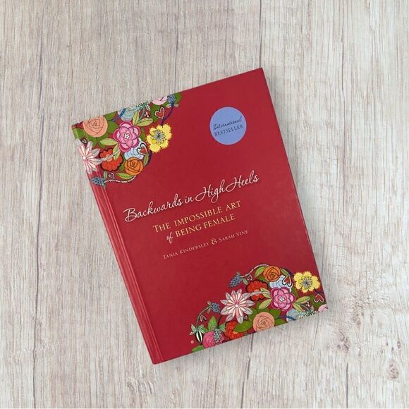 Backwards in High Heels, The Impossible Art of Being Female - Picture 1 of 4